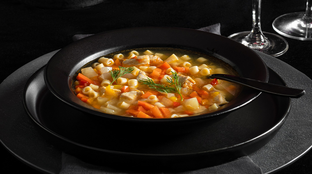 Chicken    Soup    with    “Knaidlach”    and    “Noodles”